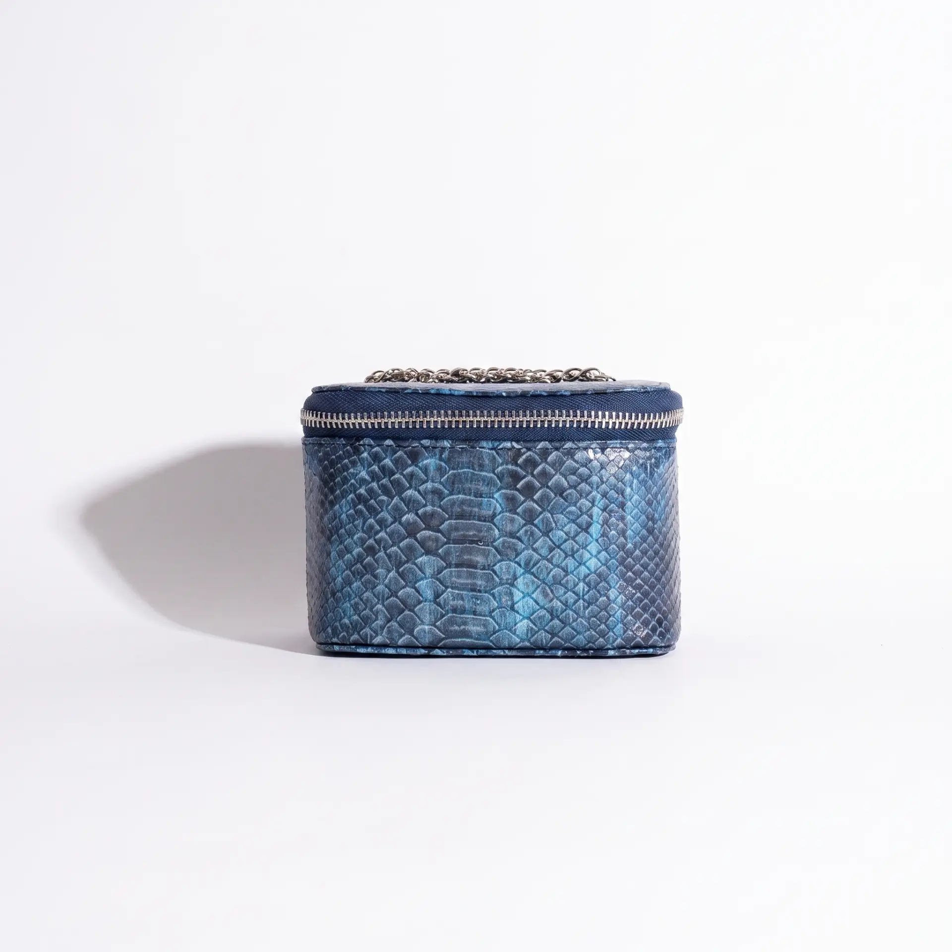 OSTIR Vanity Case in Midnight Python with chain handle
